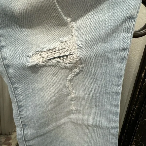 distressed blue jeans - Picture 5 of 8
